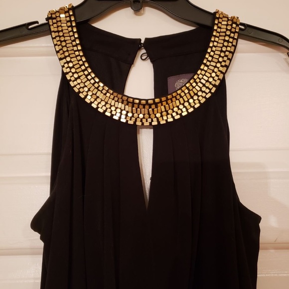 a full length black jumpsuit with a gold neckline - Picture 2 of 4